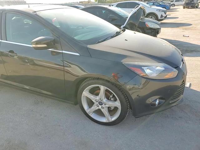 2014 Ford Focus Titanium VIN: 1FADP3J2XEL161594 Lot: 82163935