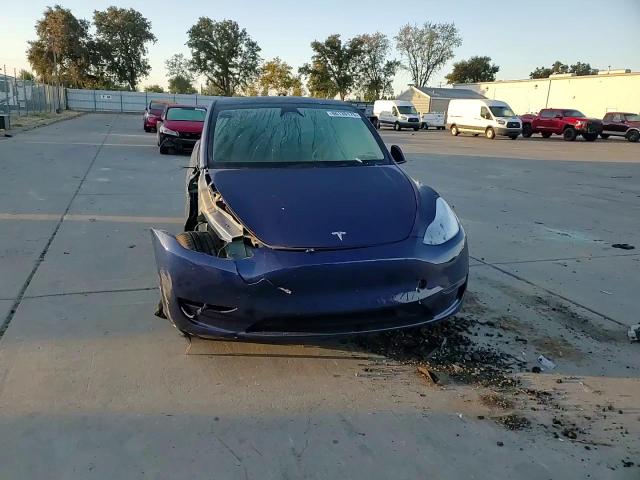 2025 Tesla Model Y VIN: 7SAYGDED1SF309579 Lot: 86130175