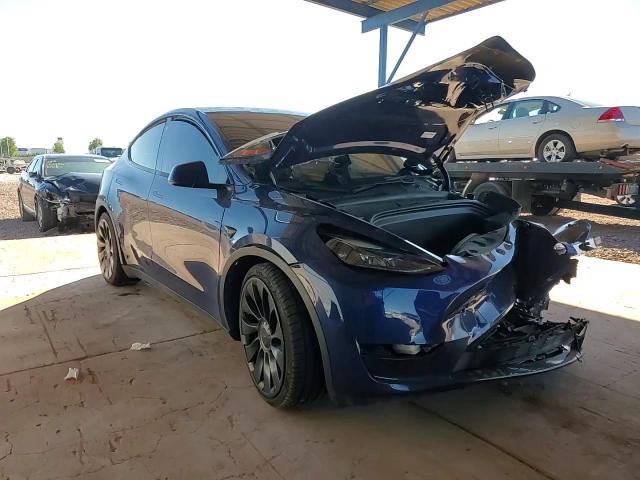 2023 Tesla Model Y VIN: 7SAYGDEF2PF599968 Lot: 86606075