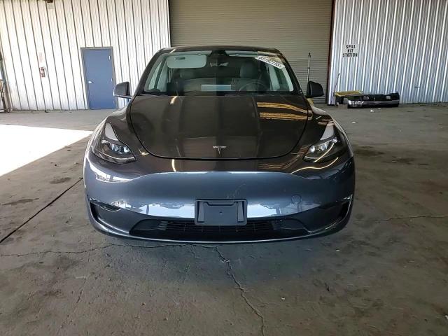 2023 Tesla Model Y VIN: 7SAYGDEE7PF928140 Lot: 85192155