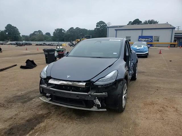 2023 Tesla Model Y VIN: 7SAYGDEE9PA179516 Lot: 89465995