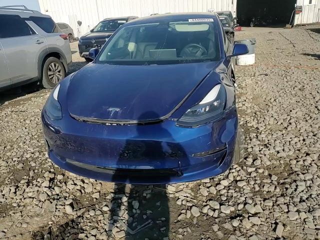 2021 Tesla Model 3 VIN: 5YJ3E1EB5MF055629 Lot: 84400035