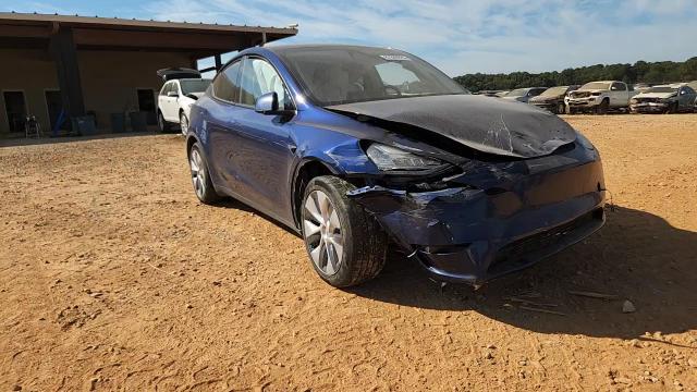 2023 Tesla Model Y VIN: 7SAYGDEE1PA158806 Lot: 87209225