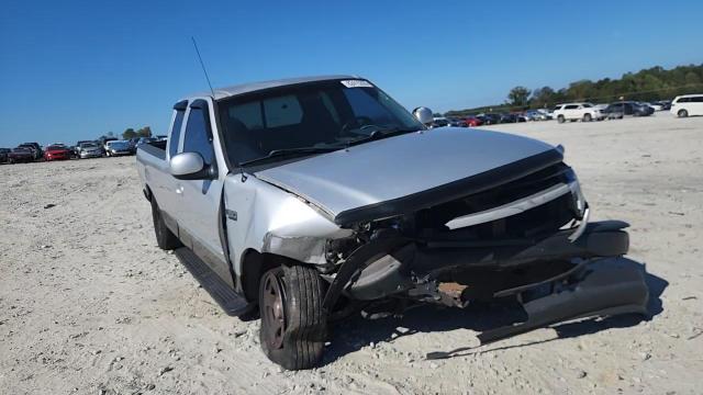 1999 Ford F150 VIN: 1FTZX1723XNA62201 Lot: 82415335