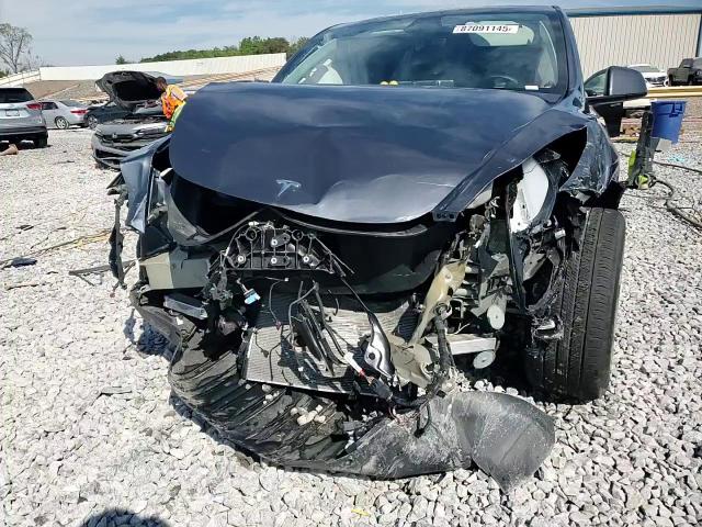 2023 Tesla Model Y VIN: 7SAYGDEE5PF799945 Lot: 87091145