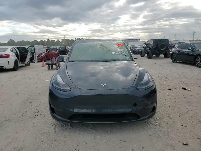2024 Tesla Model Y VIN: 7SAYGDED8RF100057 Lot: 87020275