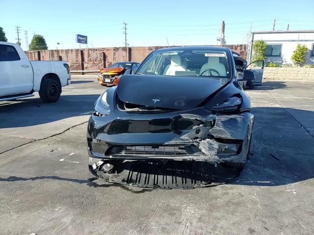 2024 Tesla Model Y VIN: 7SAYGDED4RF157775 Lot: 86852555