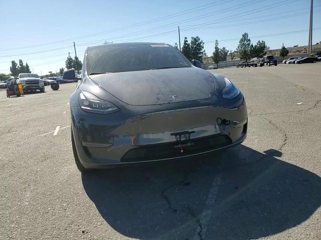 2024 Tesla Model Y VIN: 7SAYGDED7RF106609 Lot: 82500405