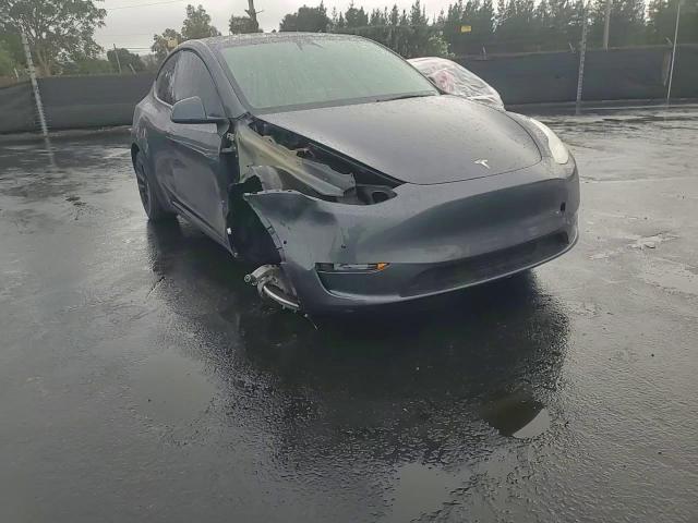 2022 Tesla Model Y VIN: 7SAYGDEE4NF559377 Lot: 84427275