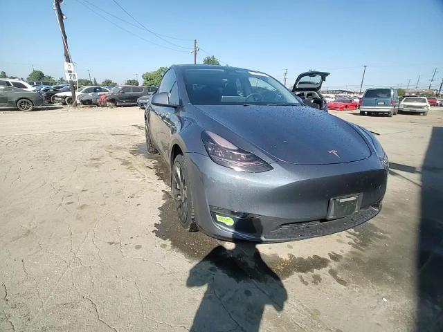 2023 Tesla Model Y VIN: 7SAYGDEE4PA028888 Lot: 89461655