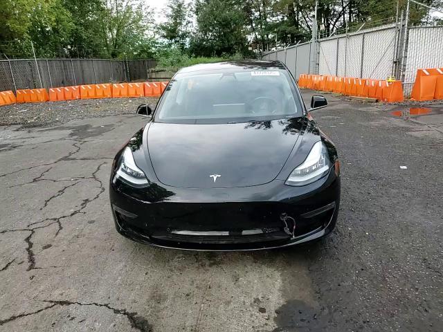 2018 Tesla Model 3 VIN: 5YJ3E1EB3JF092982 Lot: 81778375