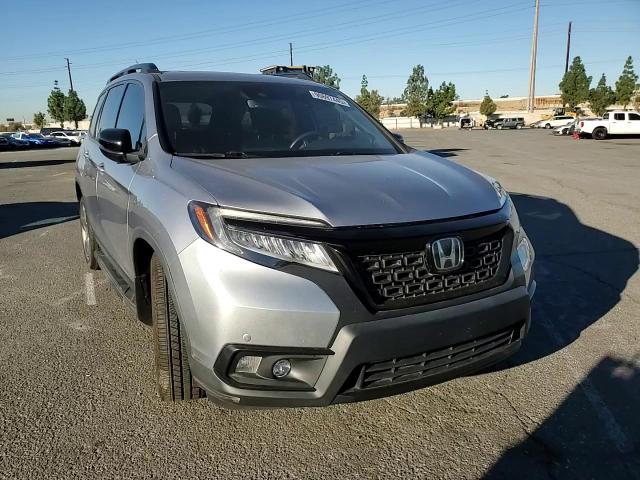 2020 Honda Passport Touring VIN: 5FNYF7H98LB004347 Lot: 90697445