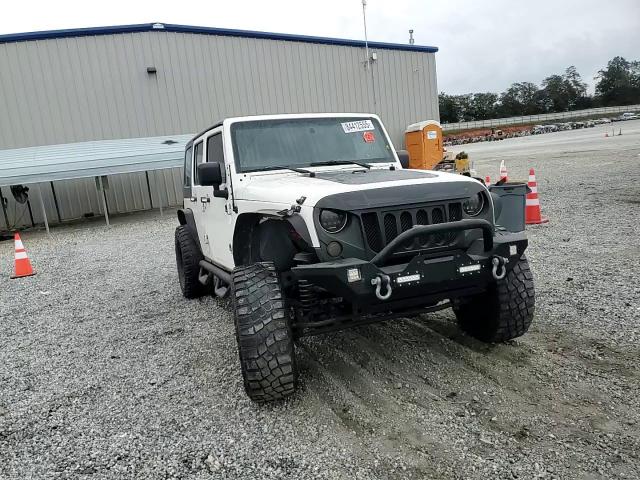 2010 Jeep Wrangler Unlimited Sport VIN: 1J4HA3H13AL117144 Lot: 84412555