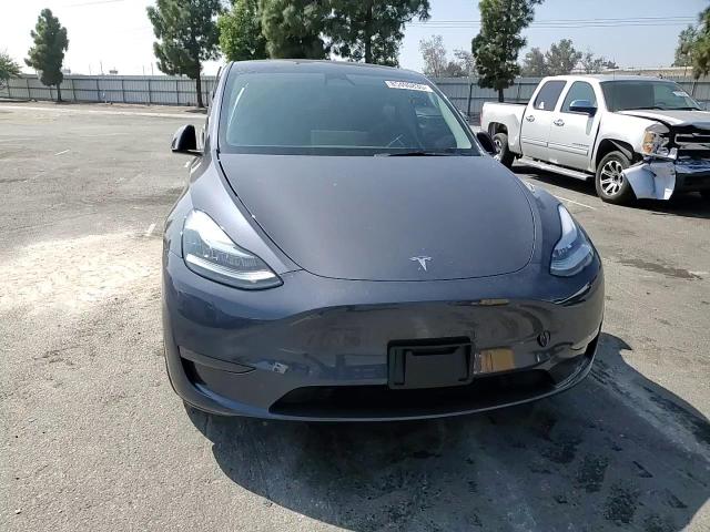 2023 Tesla Model Y VIN: 7SAYGDEE0PA085234 Lot: 85490835