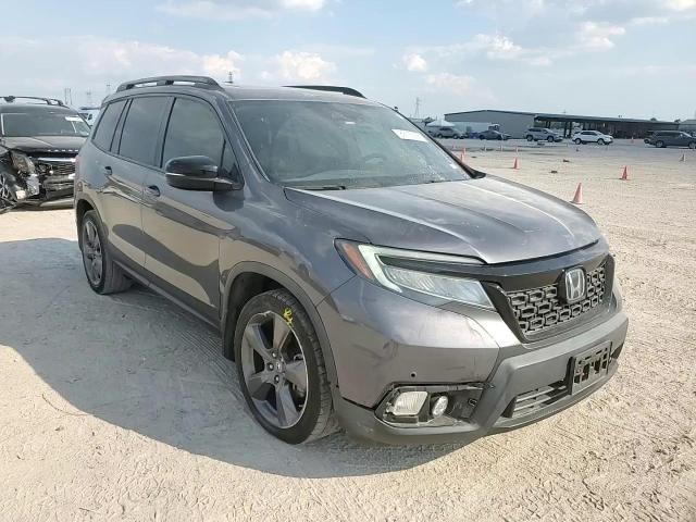 2021 Honda Passport Touring VIN: 5FNYF7H98MB010750 Lot: 82175355