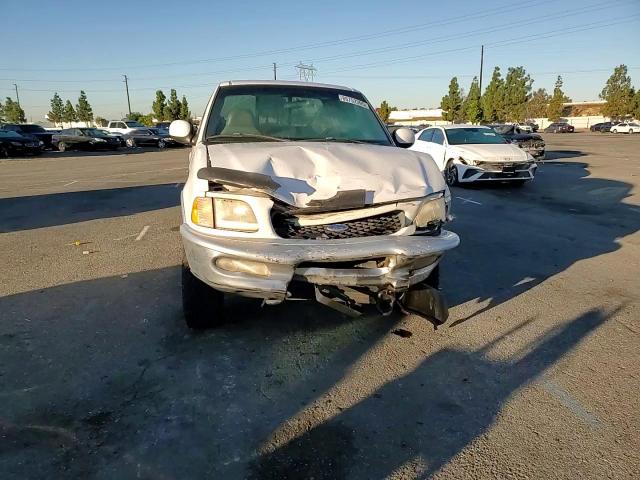 1997 Ford F150 VIN: 1FTEX18L7VKC69310 Lot: 85752395