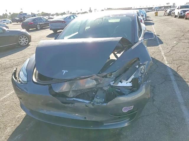 2018 Tesla Model 3 VIN: 5YJ3E1EA2JF052805 Lot: 85682655