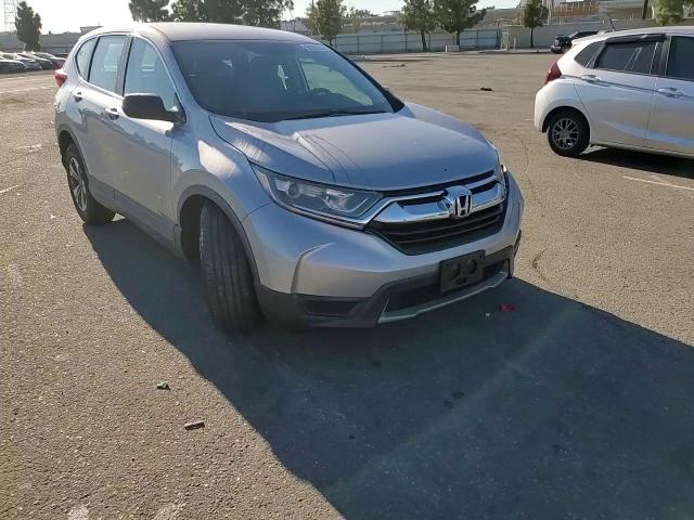 2019 Honda Cr-V Lx VIN: 2HKRW5H32KH415814 Lot: 90933395