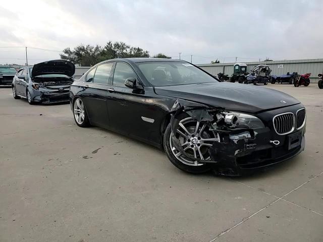 2014 BMW 740 I VIN: WBAYA6C5XED144517 Lot: 90255015