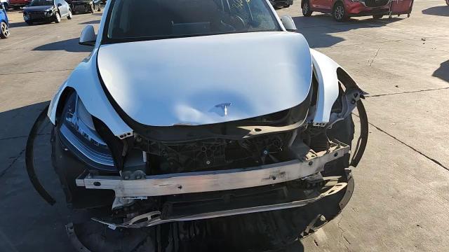 2023 Tesla Model Y VIN: 7SAYGAEEXPF60116 Lot: 90636225