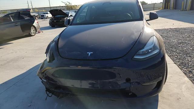 2023 Tesla Model Y VIN: 7SAYGDEE8PA135328 Lot: 85134005