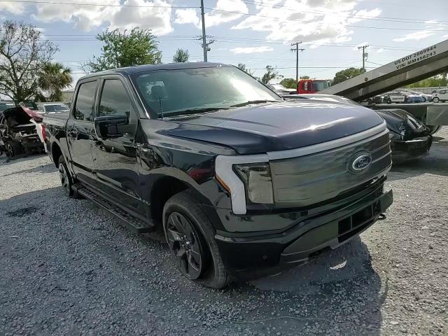 2023 Ford F150 Lightning Pro VIN: 1FTVW1EL7PWG20719 Lot: 85266825