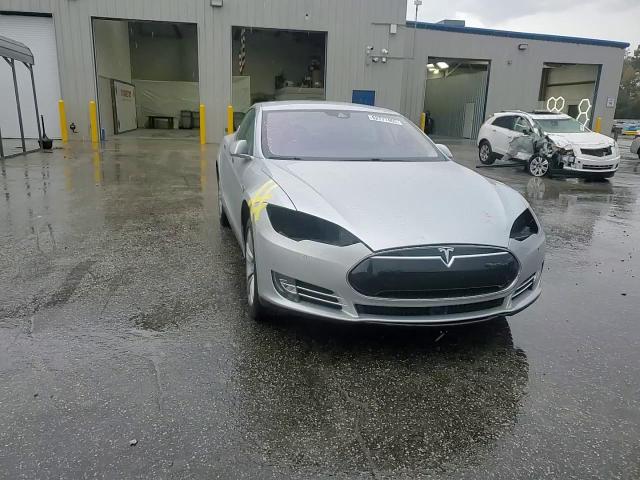 2014 Tesla Model S VIN: 5YJSA1H14EFP65049 Lot: 82777465