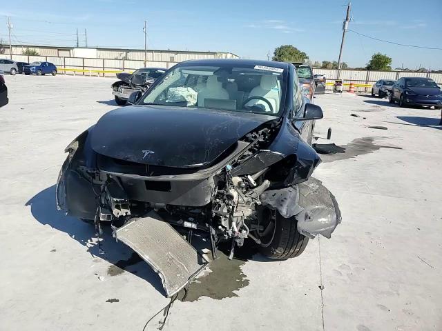 2024 Tesla Model Y VIN: 7SAYGDEE2RA268590 Lot: 90385865