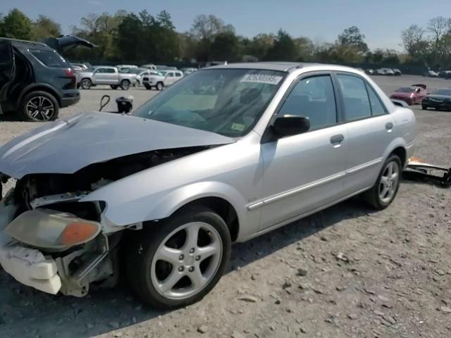 2002 Mazda Protege VIN: JM1BJ225721584923 Lot: 82630595