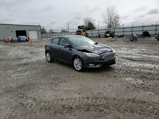 2017 Ford Focus Titanium VIN: 1FADP3N23HL243147 Lot: 82672225