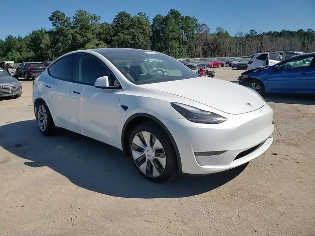 2023 Tesla Model Y VIN: 7SAYGAEE7PF877589 Lot: 87102585