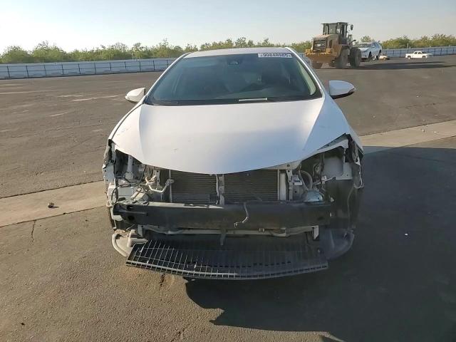 2017 Toyota Corolla L VIN: 5YFBURHE0HP694112 Lot: 90848985