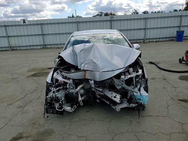 2021 Toyota Prius Prime Le VIN: JTDKAMFP0M3178027 Lot: 84288445