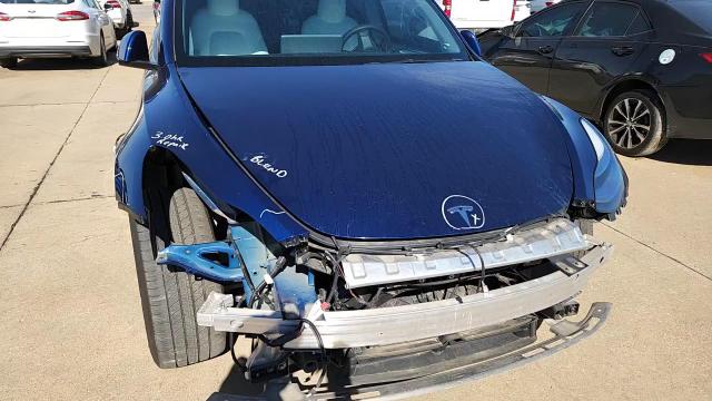 2023 Tesla Model Y VIN: 7SAYGDEE1PA080284 Lot: 85844685