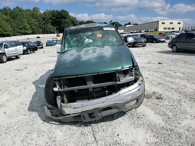 1999 Ford Expedition VIN: 1FMRU1769XLA14009 Lot: 82178345