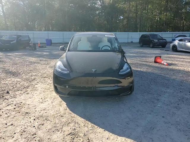 2023 Tesla Model Y VIN: 7SAYGDEE2PF604965 Lot: 86842045