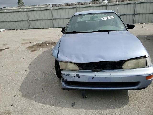 1995 Toyota Corolla VIN: 1NXAE04B0SZ297795 Lot: 85156155