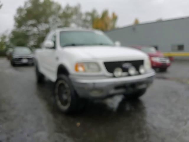 2002 Ford F150 VIN: 1FTRX18L12NA58230 Lot: 82699215