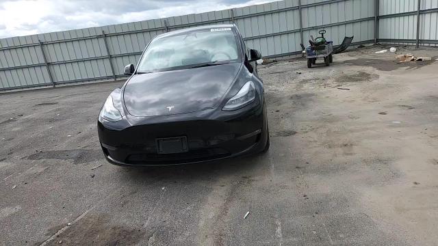 2023 Tesla Model Y VIN: 7SAYGDEF8PF918676 Lot: 82308415