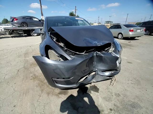 2023 Tesla Model Y VIN: 7SAYGDEE7PF898377 Lot: 84937405