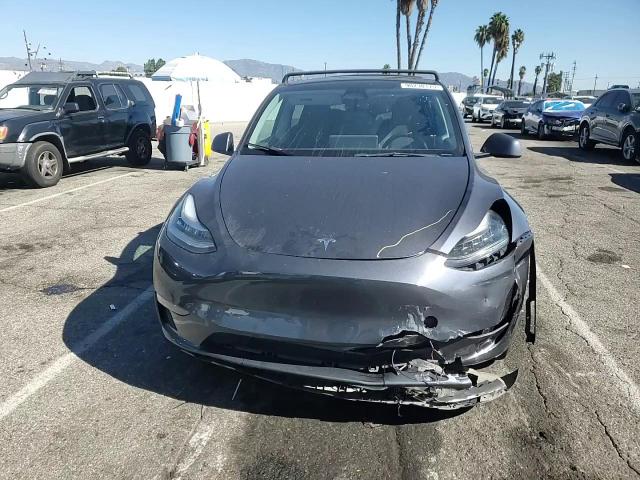 2023 Tesla Model Y VIN: 7SAYGDEE9PA085054 Lot: 90230175