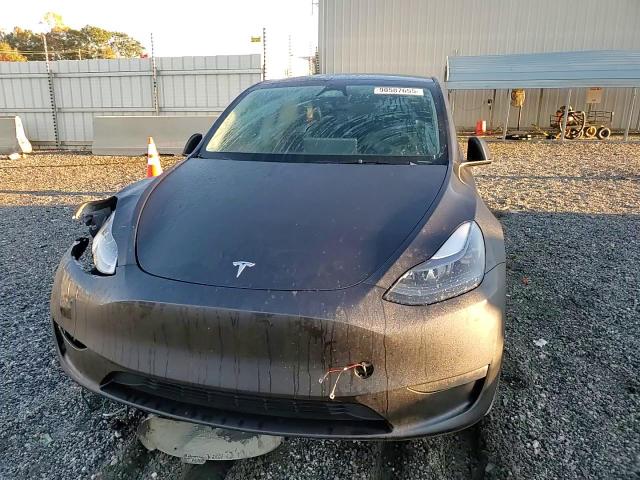 2024 Tesla Model Y VIN: 7SAYGDED2RF095759 Lot: 90587655