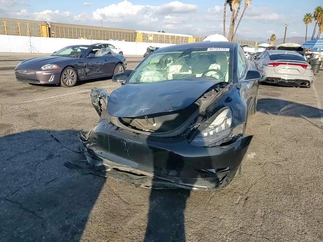 2019 Tesla Model 3 VIN: 5YJ3E1EA1KF302097 Lot: 82733715