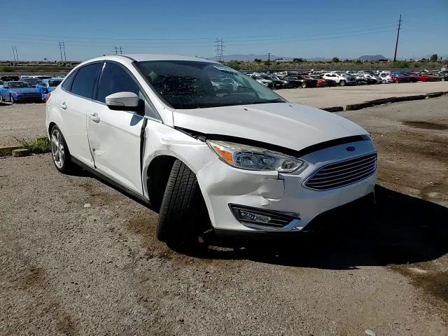 2016 Ford Focus Titanium VIN: 1FADP3J21GL230515 Lot: 85524355