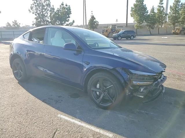 2026 Tesla Model Y VIN: 7SAYGDED5TF424140 Lot: 84655355
