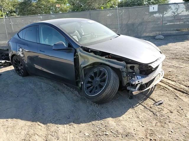 2023 Tesla Model Y VIN: 7SAYGDEE4PA080635 Lot: 89477315