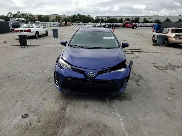 2018 Toyota Corolla L VIN: 5YFBURHE9JP792786 Lot: 85832855
