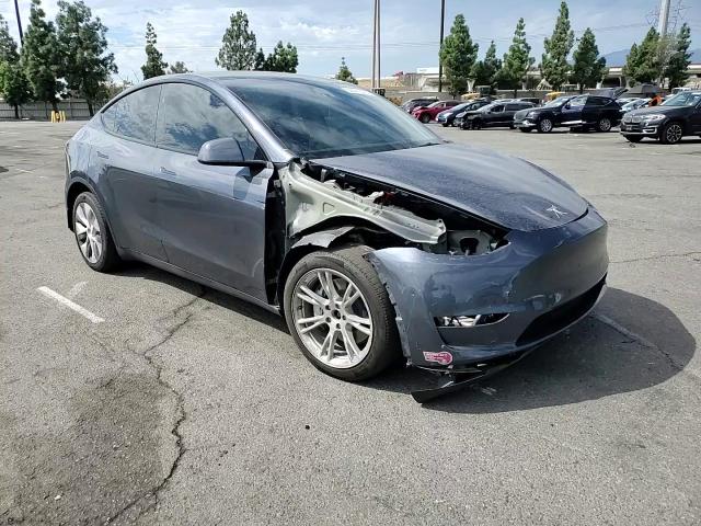 2023 Tesla Model Y VIN: 7SAYGDEE8PA208097 Lot: 84441595