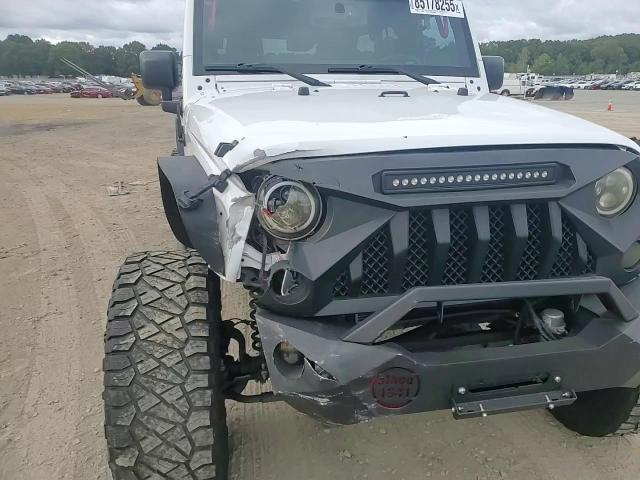 2015 Jeep Wrangler Unlimited Sport VIN: 1C4BJWDGXFL750593 Lot: 85178255