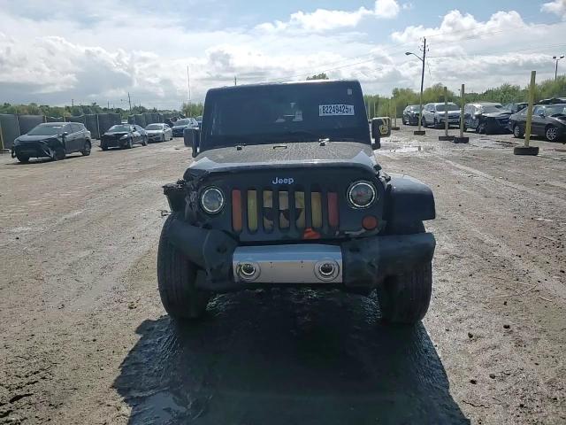2009 Jeep Wrangler Sahara VIN: 1J4FA54149L741782 Lot: 82249425